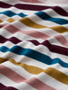 Close-up of Quad Scallion Rosehip striped organic cotton jersey fabric by Seasalt Cornwall